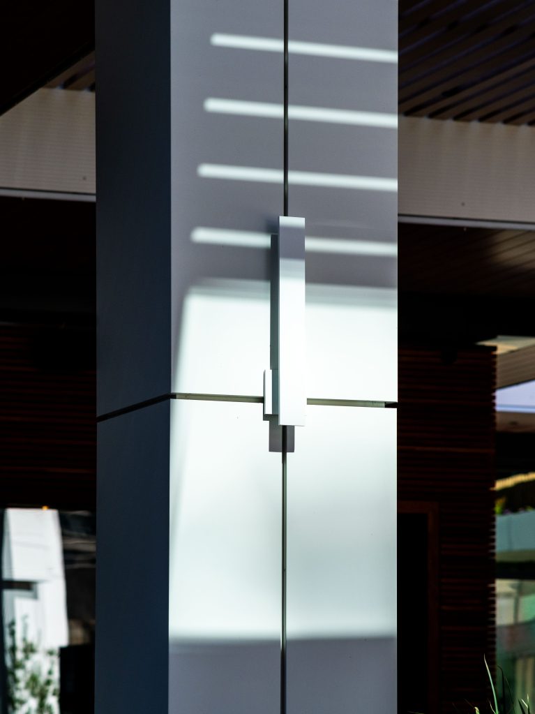 Architectural photography detail of a building column with strong shadows at The Esplanade in Biltmore.